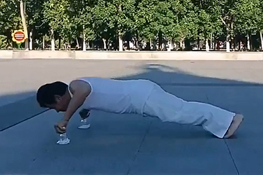 Most push-ups (holding 2 eggs) with the thumbs on 2 shot glasses performed in one minute